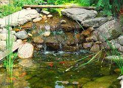 Pond excavation with waterfall